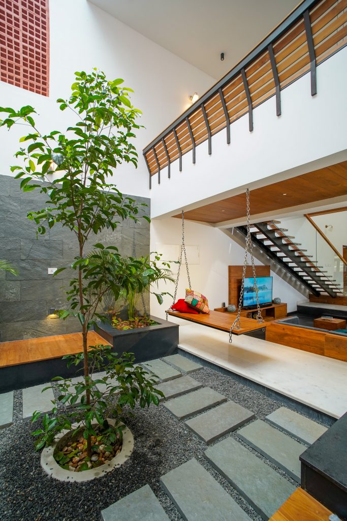 This unembellished house that is open to sunlight and the gentle breeze of Elanji tree - Scale Architectural and Design Magazine